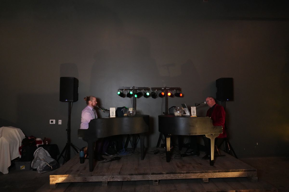 Indoor duelings pianos stage with PA and colored lights